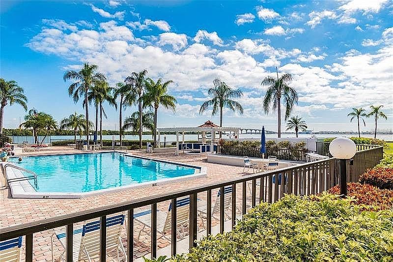 Beautiful bayfront pool and hot tub.