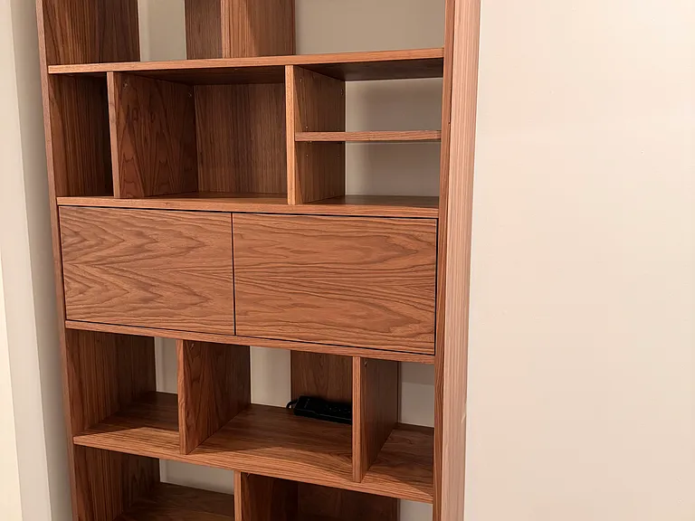 Hallway shelving for additional storage and organization.