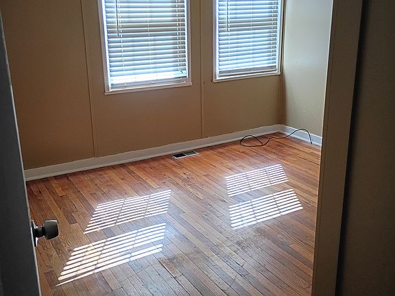 Bedroom 1 (9ft6 inches by 10ft 4 inches). A king bed will fit.