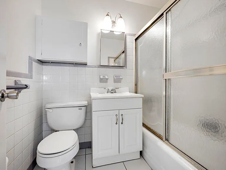 Private bathroom in first bedroom