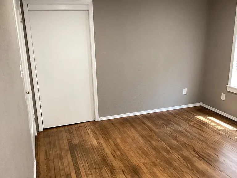 Walk-in closet in SE bedroom.