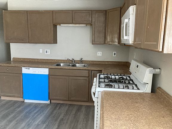 Large Fridge/Freezer, Oven, Microwave & Dishwasher included.