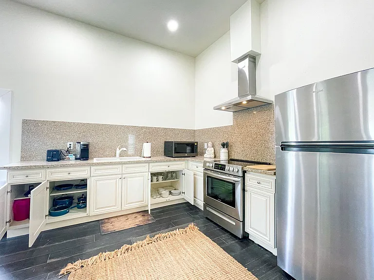 Fully stocked kitchen upstairs