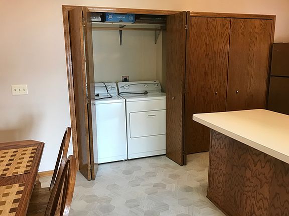 Washer dryer off kitchen