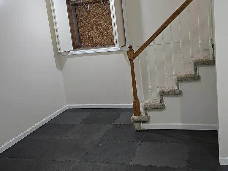 Sub-basement - exercise room, movie room, playroom with large storage closet