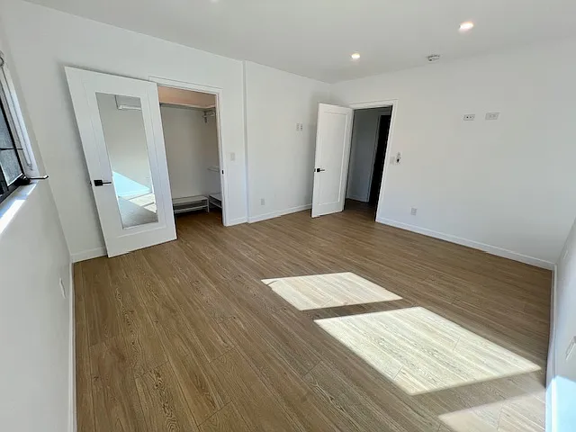 primary bedroom with walk in closet