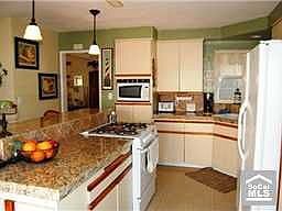 Kitchen w/ French Doors to Side Patio