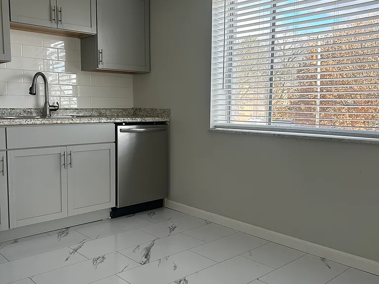 Large newly renovated Kitchen. Table space in Kitchen & large window providing fantastic lighting.