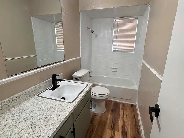 Spacious bathroom in our two bed units.