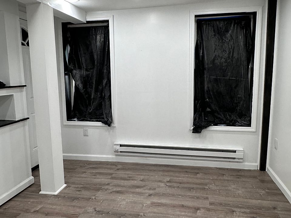 Living Room 
(*Windows are covered in this image*)