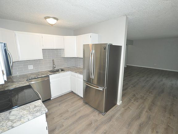 2nd image of 2120 S Vaughn Way Unit 106F