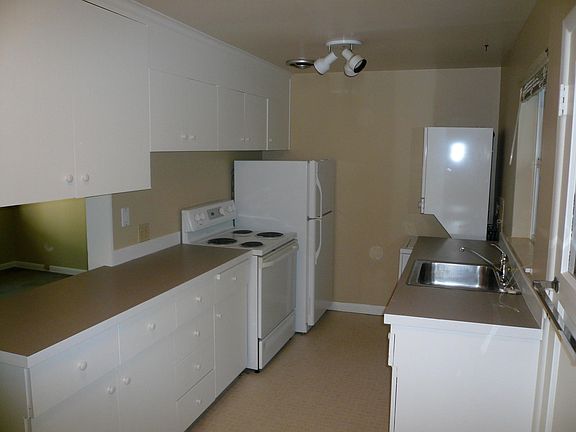 Kitchen with dishwasher, washer/dryer