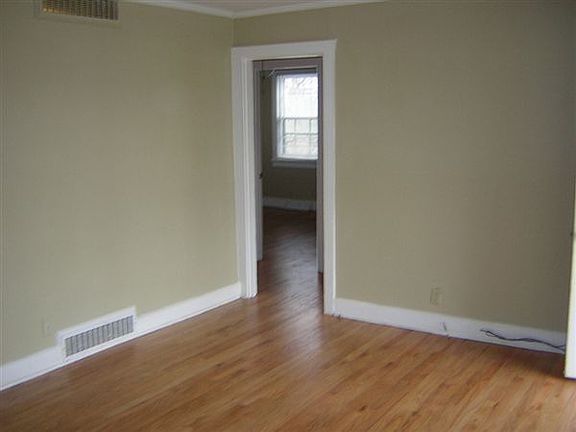 Spacious Living Room with Hardwoods