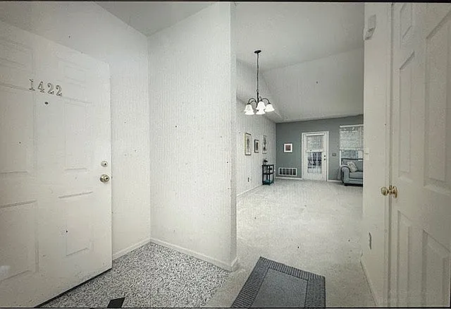 Foyer leading to dining and living area