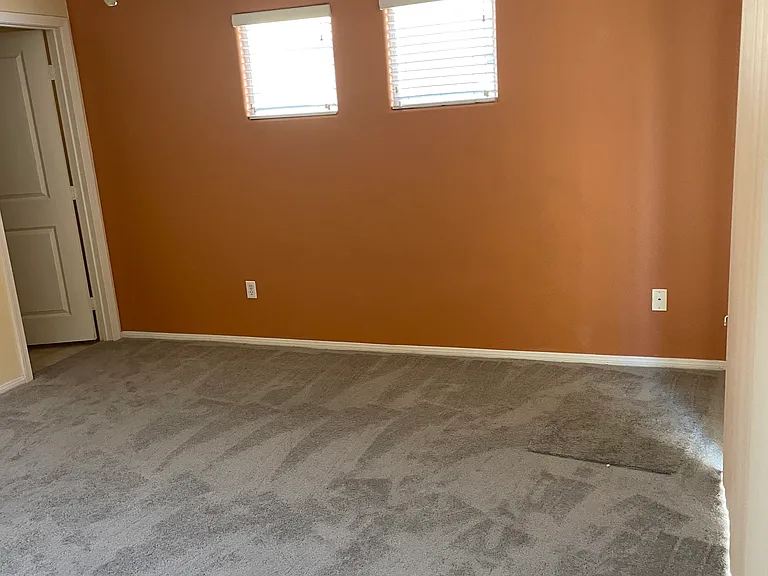 1st floor room, patio and sliding door to the right, full bathroom to the left