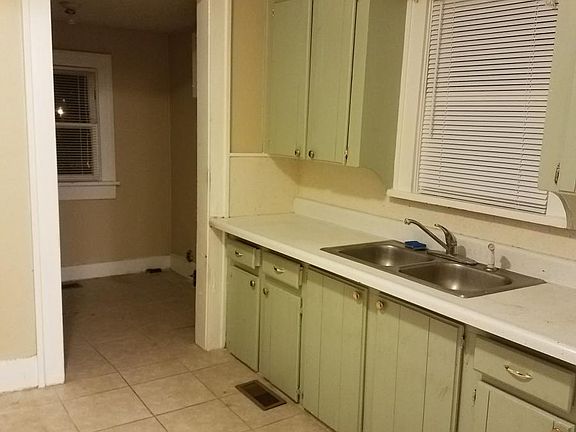 Kitchen looking into utility room