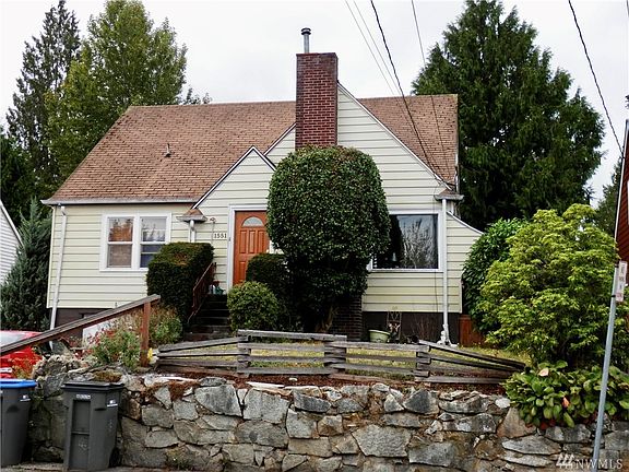 The highest house on the street with a peek-a-boo view of the water from the side.