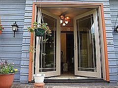 Entry door facing Leon Way
