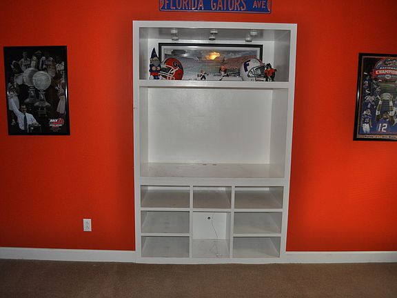 Bedroom 1. Slide in entertainment center.  Can come out and be closet