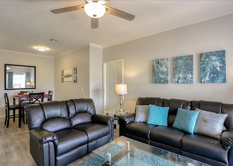 Living Room has Sofa and Loveseat that Recline