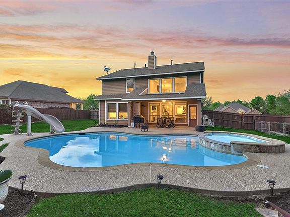 Wind down in this private backyard oasis with no back neighbors.
