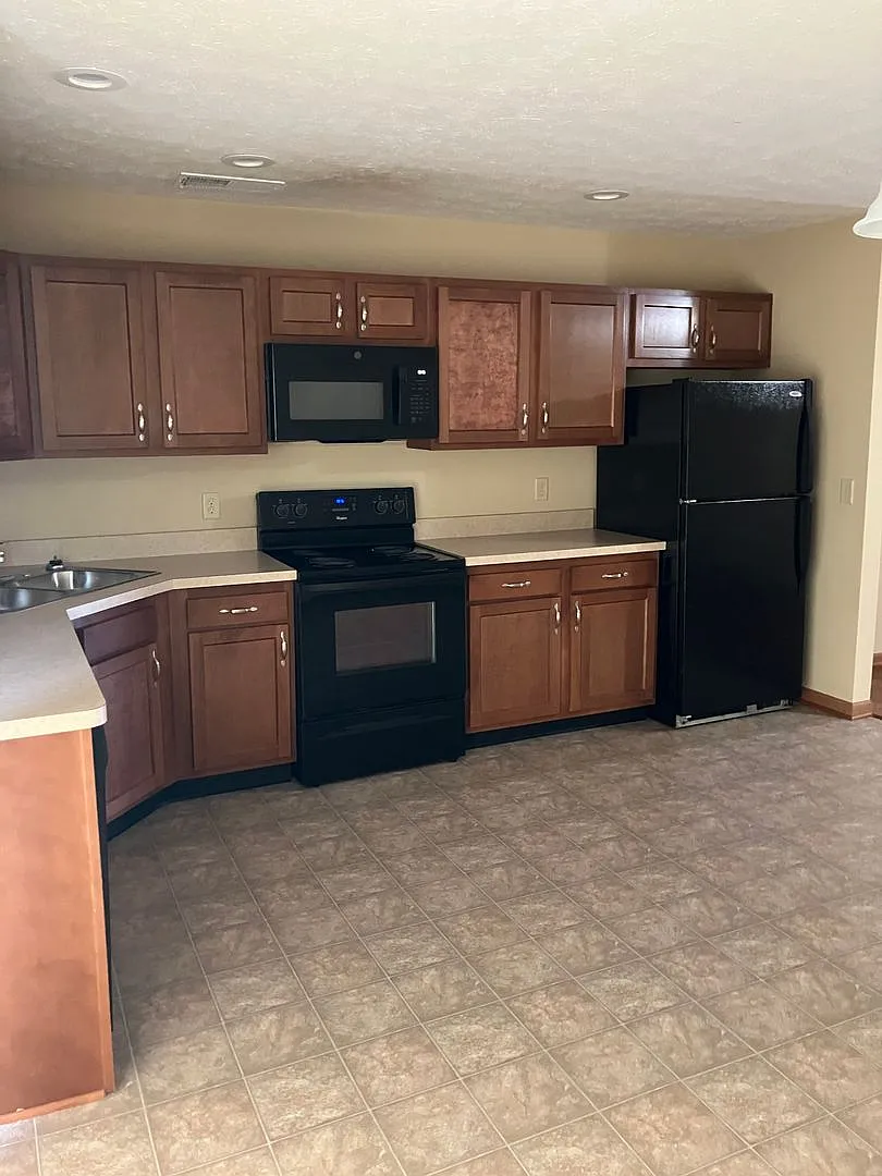 Spacious Two-Story Townhome with Attached Garage! — Photo 1