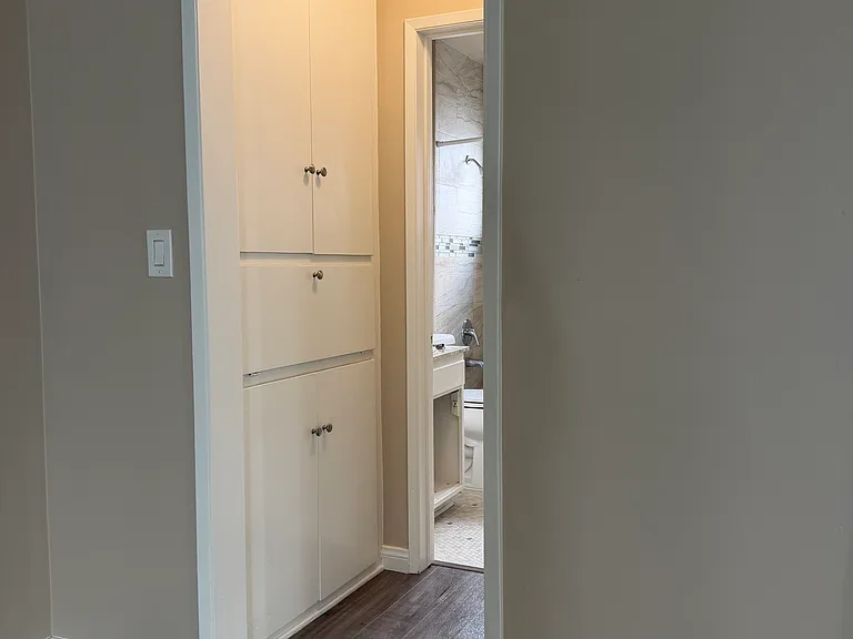 Hallway to bath and bedroom