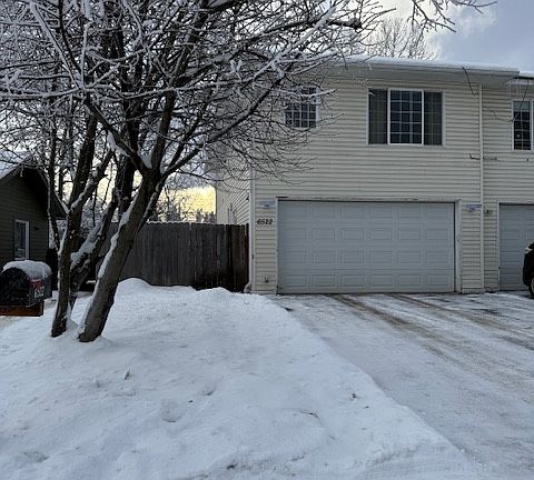 front house, gate, and mailbox