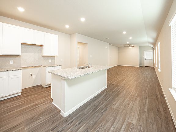 Kitchen to Dining Area and Family Room