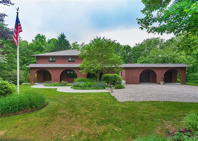Welcome to 5024 Beech Road a stately brick home nestled on 2.8 acres.