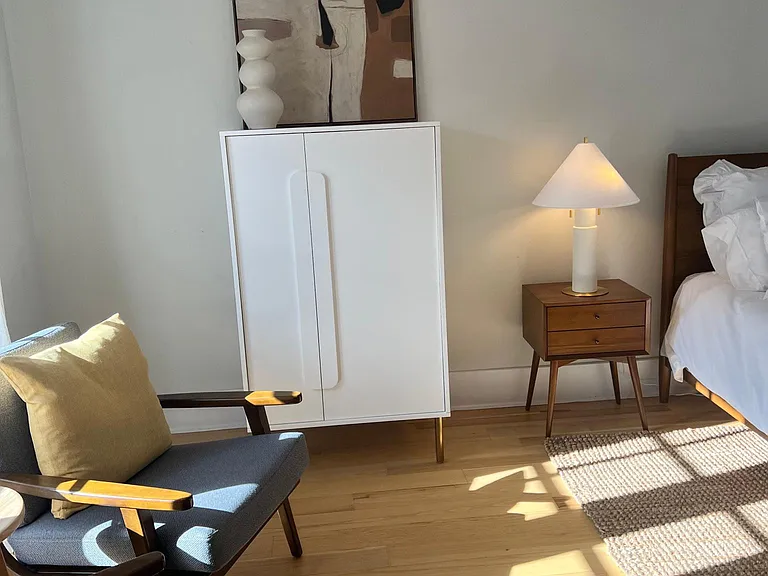 Storage and seating in the bedroom.