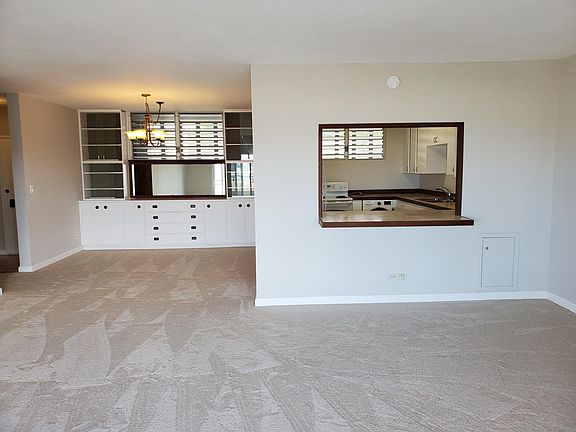 Living room looking into kitchen