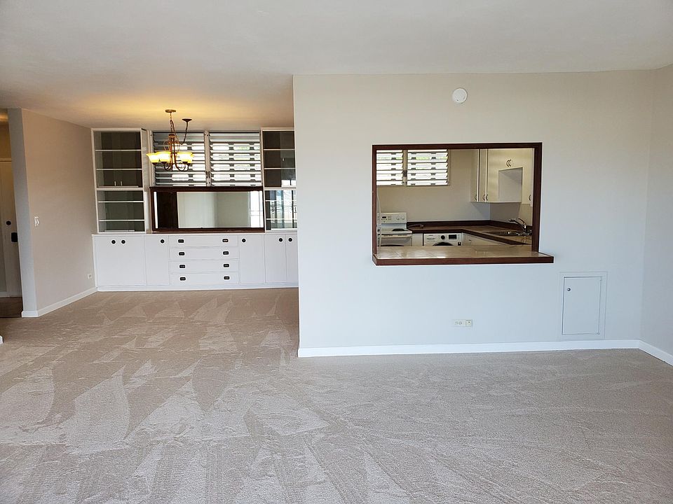 Living room looking into kitchen