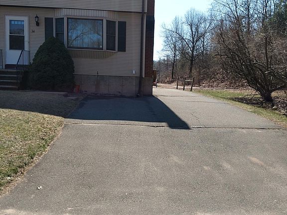 Front side of duplex. side by side parking.