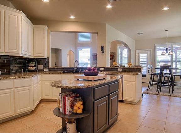 The stunning Chef's kitchen has been completely re-done! New custom glass subway tile back splash, s