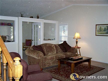 Living room with vaulted ceilings
