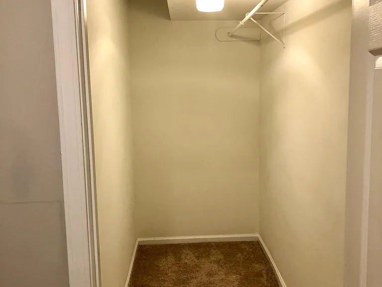Huge storage space / walk in closet next to steps