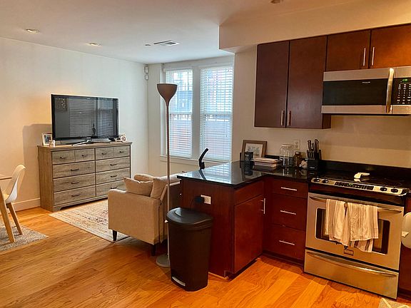 Kitchen and view into family room