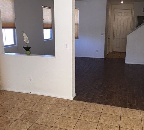 view of wood like tile floor in family room