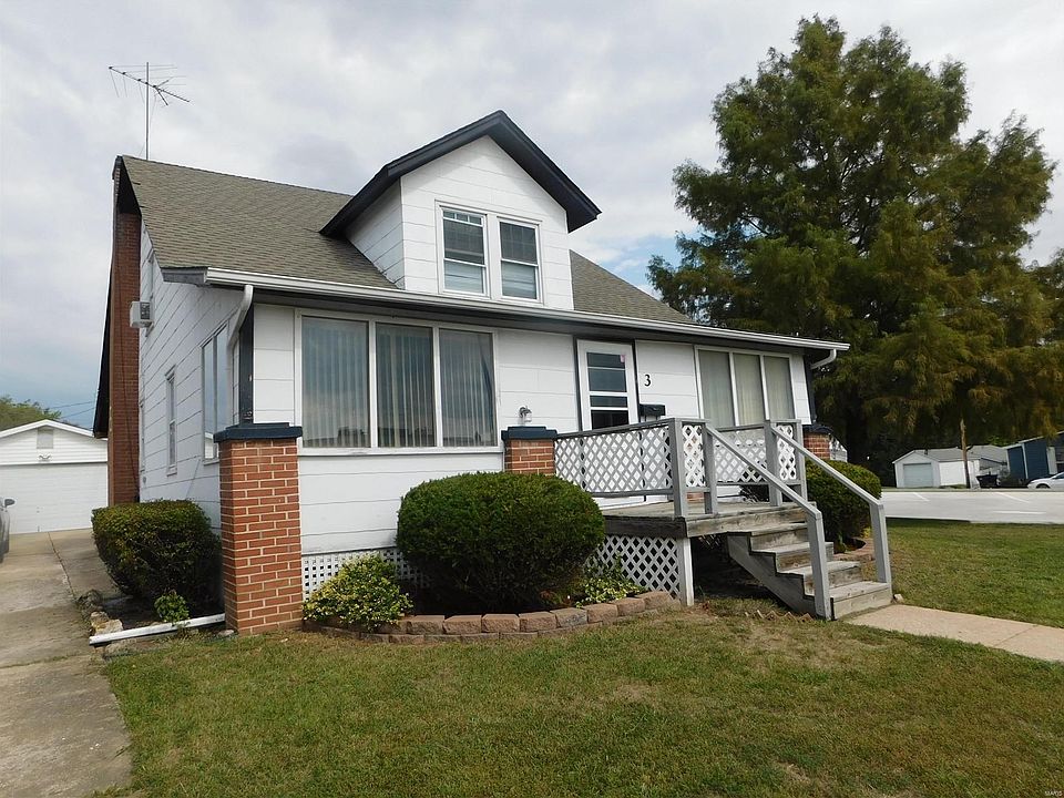 3 W. Koenig 1 1/2 story home converted to 3 family. Commercial buildings on both sides & across the street