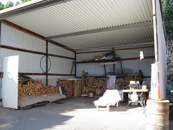 Large, covered RV storage or work shop