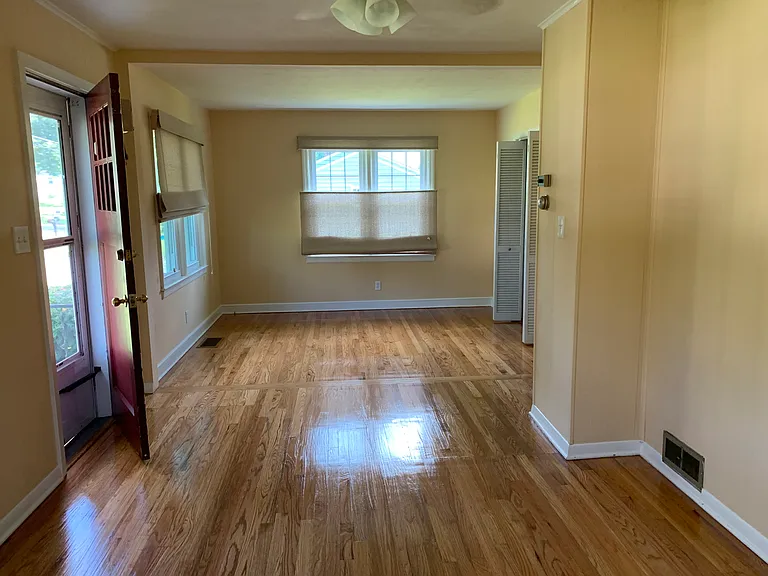 Dining area with large closet at front of the house.