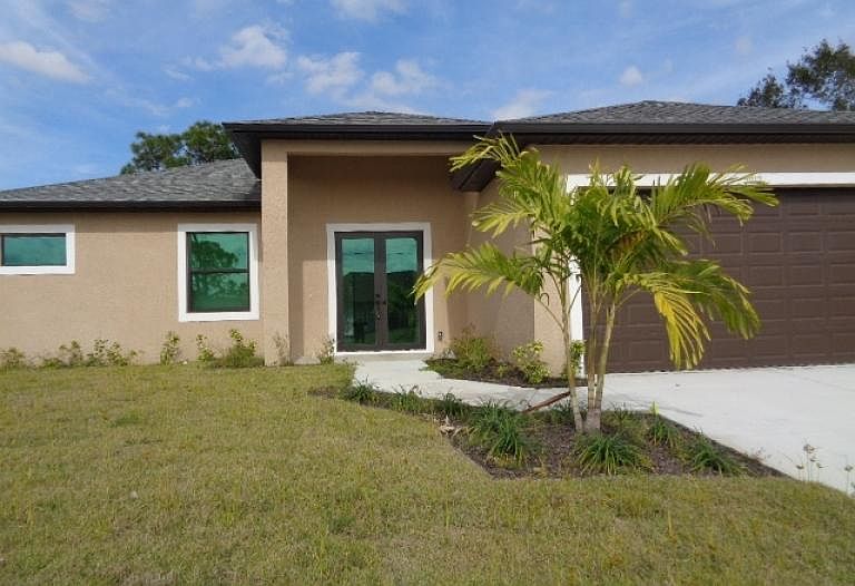 Front of Home with Double Glass Entry