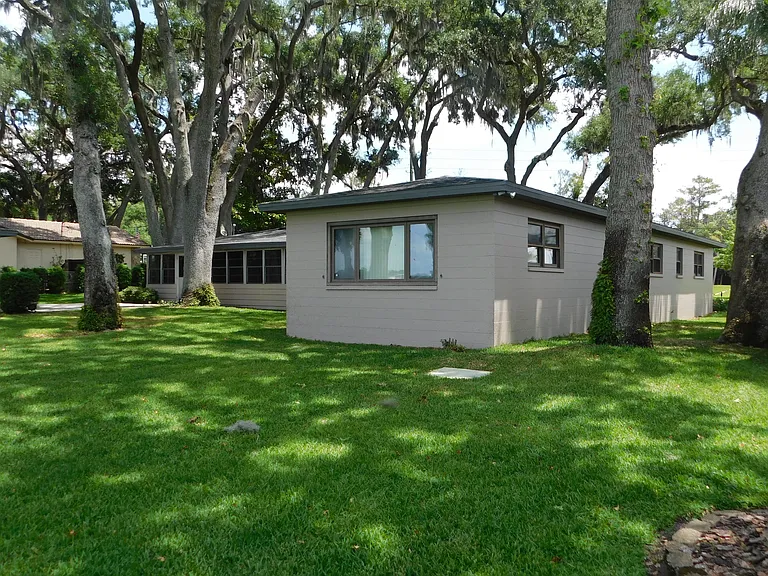 Rear elevation, looking northeast. Look at that gorgeous tree cover!