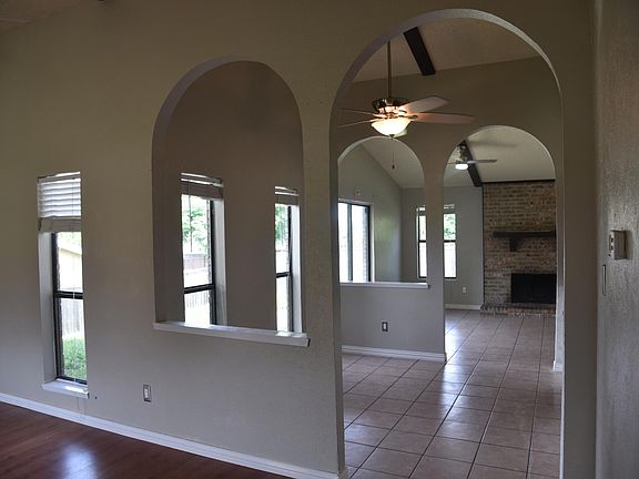 Open floorplan from Living Room to Dining Area to Den.