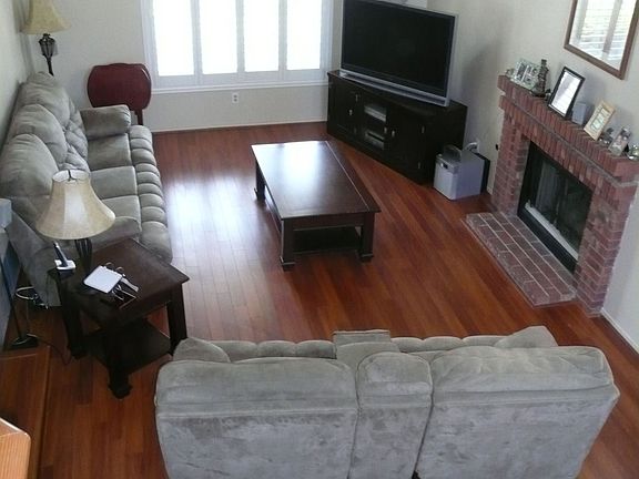 Formal Living Room w/ fireplace and pergo flooring