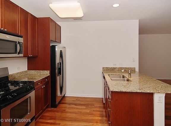 5th image of 7757 Van Buren St Unit 406