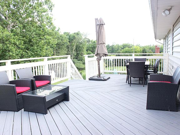 Deck furniture. Lots of space for table for 6 and additional furniture