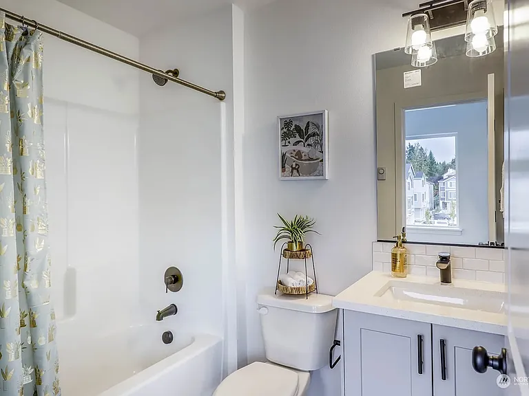 1042 NW Dragonstone St — Photo 26