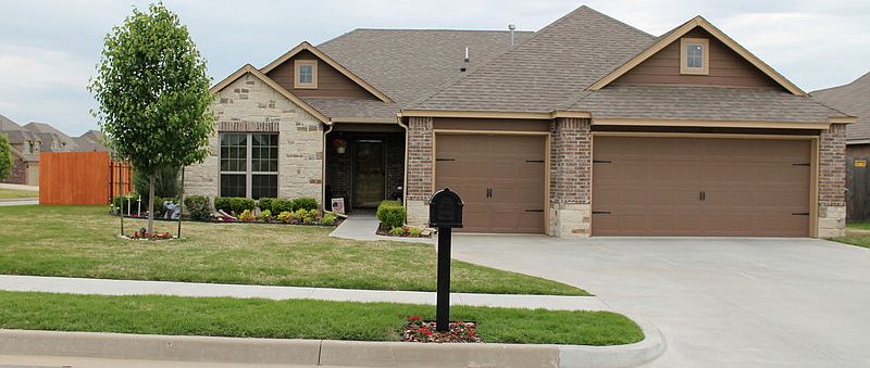 House front : House front; spring picture; plants and grass just starting to grow.